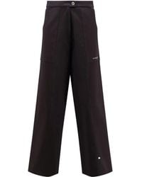 ih nom uh nit - Logo-Print Trousers - Lyst