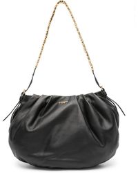 Moschino Logo Appliqué Leather Shoulder Bag in Black | Lyst