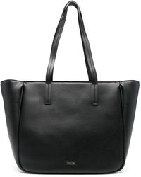 Calvin Klein - Handtasche mit Logo-Schild - Lyst