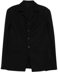 Jacquemus - Schwarze Knopfjacke Mit Taschen - Lyst