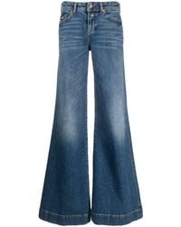 Versace - Tief sitzende Wide-Leg-Jeans - Lyst