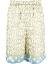 Versace - Pantalones cortos con motivo Allover - Lyst