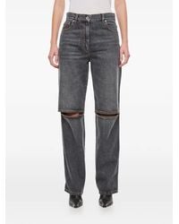 JW Anderson - Anchor-Logo Cut-Out Jeans - Lyst