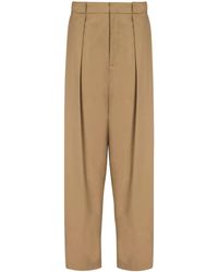 Balmain - Pantaloni con pieghe in cotone - Lyst