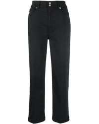 Mujer Ropa de Pantalones Pantalones de chándal con motivo gráfico Love Moschino de Algodón de color Negro pantalones de vestir y chinos de Pantalones largos 