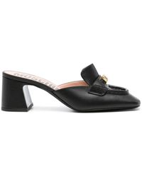Moschino - Loafer-Mules mit Logo - Lyst