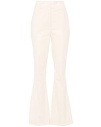 Genny - Crinkled-Finish Flared Trousers - Lyst