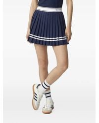 Sporty & Rich - Ally Serif Logo-Waistband Pleated Short Skirt - Lyst