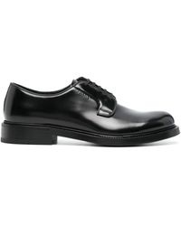 Prada - Leren Oxford Schoenen Met Logo-Reliëf - Lyst