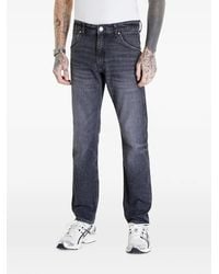 Wrangler - Logo-Patch Straight-Leg Jeans - Lyst