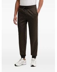 Guess - Monogram-Print Side-Stripe Track Pants - Lyst