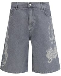 Gcds - Skull-Print Denim Shorts - Lyst