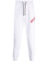 HUGO - Logo-embroidered Cotton Track Pants - Lyst