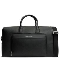 Tommy Hilfiger - Logo-Plaque Pebbled Luggage Bag - Lyst