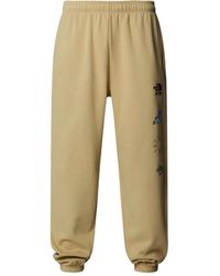 The North Face - Mountain Cleanup Graphic-Print Track Pants - Lyst