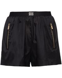 Miu Miu - Pantalones cortos de deporte con logo en la cinturilla - Lyst