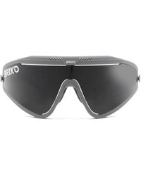 Briko - Sonnenbrille Mit Aerodynamischem Gestell - Lyst