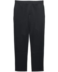 Prada - Technical Jersey Trousers - Lyst