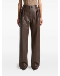 Manière De Voir - Pebbled Leather Pleated Stacked Trousers - Lyst