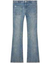 Courreges - Halbhohe Bootcut-Jeans - Lyst