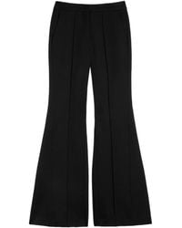 Jil Sander - Flared Wool Trousers - Lyst