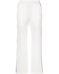 adidas originals mixed stripe popper pants in black and white