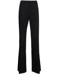 The Row - Mid-Rise Bootcut Trousers - Lyst