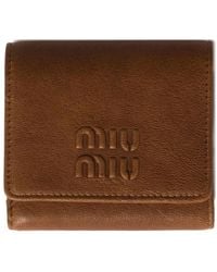 Miu Miu - Cartera con logo en relieve - Lyst