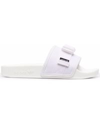 mint green adidas slides