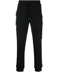 Woolrich - Pantalones de chándal con logo estampado - Lyst