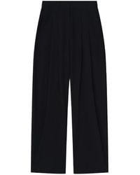 Nanushka - Seka Tapered-Leg Tailored Silk Trousers - Lyst