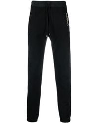 Saint Laurent - Embroidered-logo Cotton Track Pants - Lyst