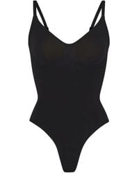 Skims - Body sin costuras con cuello en V - Lyst