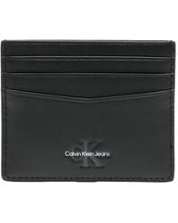 Calvin Klein - Porte-cartes en cuir à logo embossé - Lyst