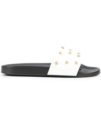 Heren Schoenen voor voor Sandalen badslippers en teenslippers voor Leren sandalen Versace Leer Slippers Verfraaid Met Medusa Logo in het Zwart voor heren 