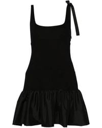 Sandro - Jersey Mini-Jurk Met Peplum Afwerking - Lyst
