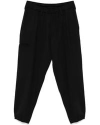 Yohji Yamamoto - Elasticated Wool Tapered Pleated Trousers - Lyst