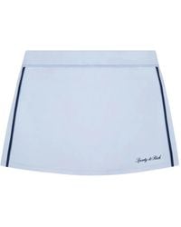 Sporty & Rich - Signature Logo-Print Side-Stripe Court Mini Skirt - Lyst