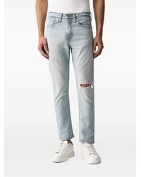 Levi's - 515 Slim Taper Distressed Jeans - Lyst