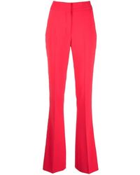 Genny - Pressed-crease Flared Tailored Trousers - Lyst