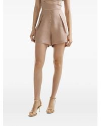 Mia Peculiar - Wave-Design Pleated Shorts - Lyst