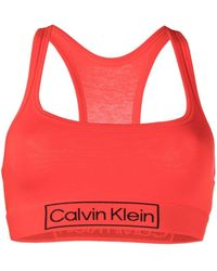 Calvin Klein - Corpiño con banda del logo - Lyst