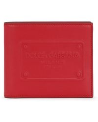 Dolce & Gabbana - Portafoglio bi-fold con logo goffrato - Lyst