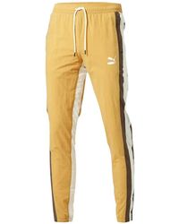 PUMA - Woven Stripe Track Pants - Lyst