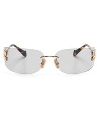 Miu Miu - Sonnenbrille Mit Logo-Schild - Lyst