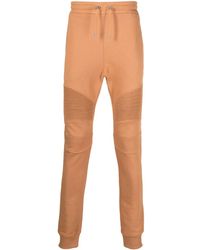 Balmain - Pantalones de chándal con logo estampado - Lyst