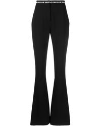 Versace - Logo-waistband Flared Trousers - Lyst