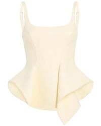 KHAITE - Peplum Top - Lyst