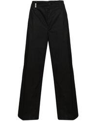 Versace - Pantalones anchos de talle medio - Lyst