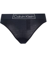 Calvin Klein - String en coton à bande logo - Lyst